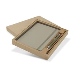 A green notebook and silver pen gift set displayed in a kraft paper box. The set includes a sleek design with a logo.