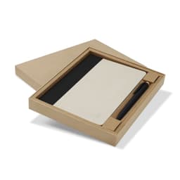 A notebook with a cream cover and a black pen, presented in a kraft gift box.