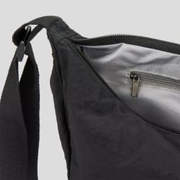 A black bag with a zippered opening and an interior pocket, featuring a sturdy strap. It has a simple, sleek design.