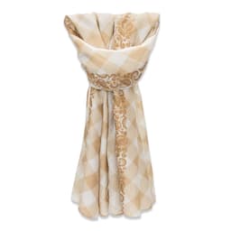 A lightweight scarf featuring a cream and beige patterned design, styled elegantly in a loop.