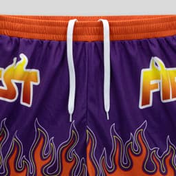 Custom women's active shorts in purple with orange accents, featuring a flame design and a drawstring waistband.