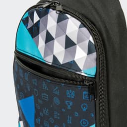 A crossbody bag featuring a geometric pattern in black, turquoise, and grey with zippered compartments and a logo.