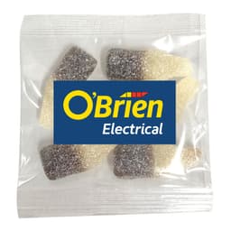 Sour cola bottle lollies in a clear packet, featuring a mix of brown and cream colours. Includes a logo.