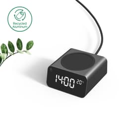 A wireless charger and alarm clock in black with a digital display, made from recycled aluminium.