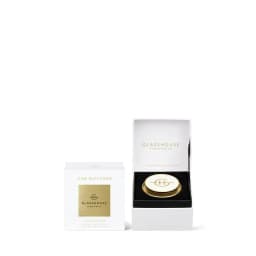 A gold car diffuser in a white box, featuring the Glasshouse branding and the name "A Tahaa Affair."