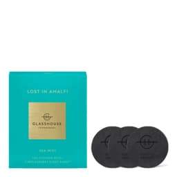 A teal box containing three black scent discs for a car diffuser, labelled "Lost In Amalfi" and featuring a logo.