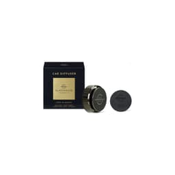A black car diffuser with a gold box, featuring a refill scent disk named "Lost In Amalfi".