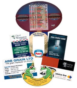 A collection of promotional fridge magnets featuring various designs, colours, and branding from different organisations.