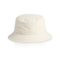 A cream nylon bucket hat with a rounded top and wide brim. It features a logo tag.