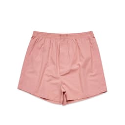 A pair of light pink boxer shorts featuring an elastic waistband and a simple design.