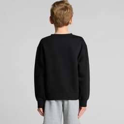 A black jumper featuring long sleeves, viewed from the back, worn by a child with light brown hair.