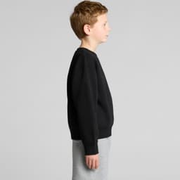 A black youth crew jumper, featuring a simple design and a ribbed neckline, displayed on a child.
