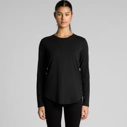 A long-sleeve black t-shirt with a curved hem and a logo. The model is standing front-facing.