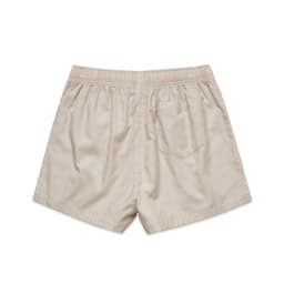 Light beige dress shorts featuring an elastic waistband and a single back pocket. Contains a logo.