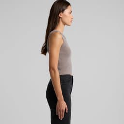 A cropped tank top in faded beige, featuring a fitted design and sleeveless style, with a logo visible.