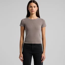 A fitted t-shirt in a faded brown colour with short sleeves, displayed on a model against a neutral background.