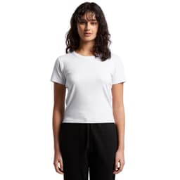 A white ribbed baby tee with short sleeves, modelled by a female figure, paired with black trousers.