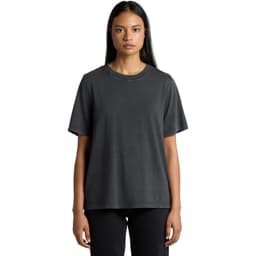 A woman wearing a stone wash heavy tee in charcoal grey, featuring a relaxed fit and short sleeves.