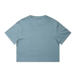 A light blue, cropped t-shirt featuring a plain back and short sleeves, with a logo present.