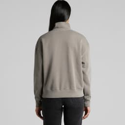A faded half zip jacket in grey with a collar, featuring a simple design and relaxed fit on the back.