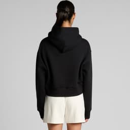 A black crop hoodie with a snug fit and a large hood, featuring a branding logo on the back.