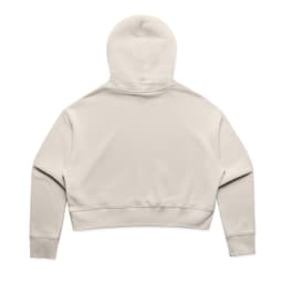 A cropped hoodie in a light beige colour, featuring a hood and long sleeves, with a brand logo on the back.