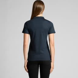 A navy polo shirt with a short collar and fitted design, viewed from the back on a model.