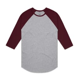 A grey and burgundy raglan tee with three-quarter sleeves, featuring a logo on the label.
