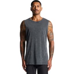 A man wearing a stone wash grey tank top with a round neckline and tattoos visible on his arms.