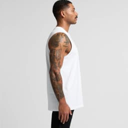 A white sleeveless tank top displayed on a model with tattoos, featuring a logo on the chest.