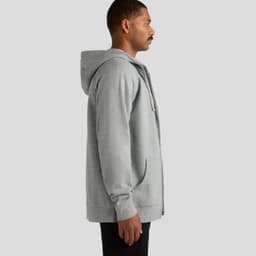 A grey zip-up hoodie with a hood, featuring side pockets and a logo, shown on a model from the side.