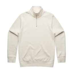 A cream-coloured half zip crew jumper, featuring long sleeves and a zippered collar, with a logo on the front.
