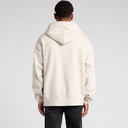 A heavy zip hood made of cream-coloured fabric, featuring a hood and a relaxed fit at the back.
