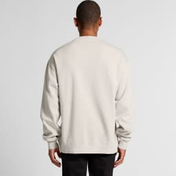 A light beige crew jumper viewed from the back, featuring long sleeves and a simple design. It has a logo.