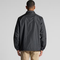 A black coach jacket with a relaxed fit, featuring long sleeves and a collar. The back view shows a clean design.