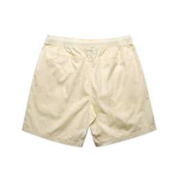 Cream-coloured beach shorts featuring an elastic waistband and a simple design. Includes a logo.