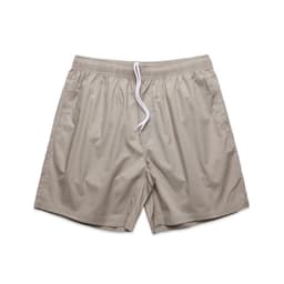 Beige beach shorts with an elastic waistband and white drawstring. Features a logo on the waistband.