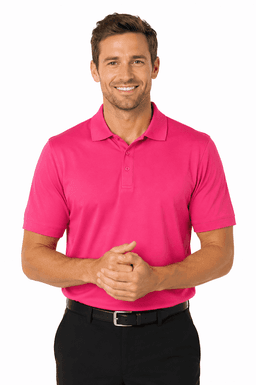 A man wearing a vibrant pink polo shirt, smiling with hands clasped, paired with black trousers. The shirt features a logo.