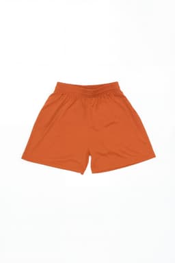 Youth Core Shorts in bright orange with an elastic waistband and a simple design. Features branding.