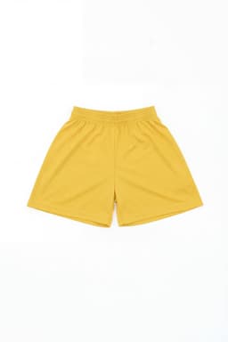 Yellow sports shorts with an elastic waistband, featuring a logo. Ideal for active youth.