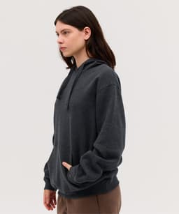 A dark grey hoodie with a front pocket and drawstring hood, featuring a brand logo.