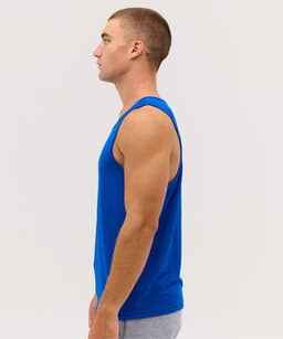 A blue singlet is displayed on a mannequin, showcasing a side view of its fit and style.