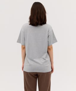 A grey t-shirt with short sleeves, displayed from the back view. The garment features a logo on the back.