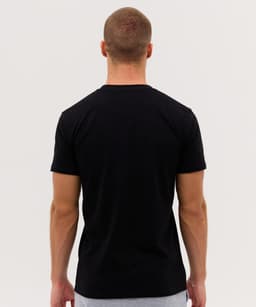 A black T-shirt displayed from the back, featuring a fitted design and short sleeves. It has a logo on the rear.