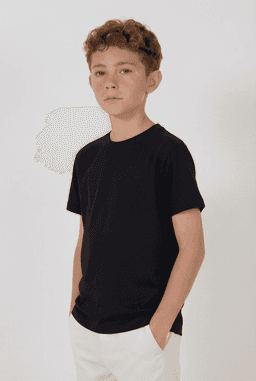 A black youth essential tee displayed on a model, standing with hands in pockets against a neutral background.