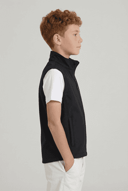 A black softshell vest for youth, featuring a zip-up front and side pockets. Designed with a slim fit.