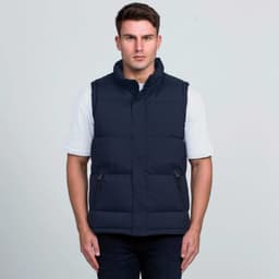 A navy puffa vest with a high collar, featuring zippered pockets and a logo. Worn by a model against a neutral background.