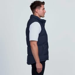 A navy smpli Junction Puffa Vest with a high collar and zip pockets, shown from the side.