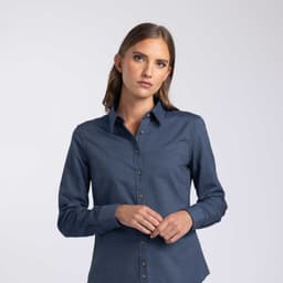 A women's button-up shirt in navy blue with a classic collar and button detailing. It features a logo.