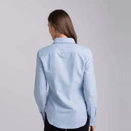 A blue women's button-up shirt with a fitted design, featuring a collar and long sleeves.